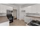 Modern kitchen features stainless steel appliances, and ample counter space for meal preparation at 1200 Craig Ave, Lancaster, SC 29720