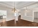 Open concept living area flows into a modern kitchen, perfect for entertaining and Gathering gatherings at 1200 Craig Ave, Lancaster, SC 29720