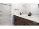 Bathroom features a double vanity with quartz countertops and a shower-tub combination with tile surround at 122 Asmodean Ln, Troutman, NC 28166