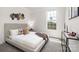 Bedroom featuring natural lighting and neutral decor at 122 Asmodean Ln, Troutman, NC 28166