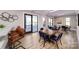 The community room has a kitchenette with barstool seating as well as several tables and chairs for residents at 122 Asmodean Ln, Troutman, NC 28166