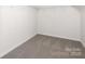 Empty carpeted walk-in closet with wire shelving at 122 Asmodean Ln, Troutman, NC 28166