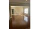 Inviting living room with abundant natural light from large windows at 1229 Mcgill Pond Ln, Rock Hill, SC 29732
