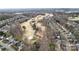 A high altitude aerial view of homes surrounding the golf course at Highland Creek at 12430 Kemerton Ln # 17, Huntersville, NC 28078