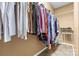 Walk-in closet featuring built-in shelving and ample storage space for organizing clothes and accessories at 12430 Kemerton Ln # 17, Huntersville, NC 28078