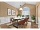 Charming dining room with modern furnishings, stylish decor, and ample natural light at 12430 Kemerton Ln # 17, Huntersville, NC 28078