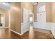 Spacious foyer with hardwood flooring, detailed trim, and natural light at 12430 Kemerton Ln # 17, Huntersville, NC 28078