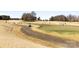 Picturesque view of a golf course showcasing lush green fairways at 12430 Kemerton Ln # 17, Huntersville, NC 28078
