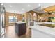Bright kitchen featuring an island, white cabinetry, and stainless steel appliances at 12430 Kemerton Ln # 17, Huntersville, NC 28078