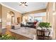 Cozy living room with a large rug, comfortable seating, and a view into kitchen at 12430 Kemerton Ln # 17, Huntersville, NC 28078