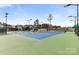 View of tennis courts showcasing its well maintained court and surrounding greenery at 12430 Kemerton Ln # 17, Huntersville, NC 28078
