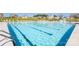 Community pool with multiple swim lanes and lounge seating at 128 Asmodean Ln, Troutman, NC 28166