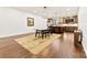 Open kitchen featuring a dining table and wooden accents at 13124 Lemmond Dr, Matthews, NC 28105