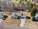 Aerial view of the property showcasing the house, driveway, and surrounding landscape at 1345 Beagle Run, Salisbury, NC 28146