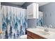 Bathroom featuring a white vanity and a shower with blue tree curtain at 1345 Beagle Run, Salisbury, NC 28146