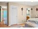 Bedroom with a fan, closet, and attached bathroom at 1345 Beagle Run, Salisbury, NC 28146