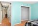 Bright bedroom features wood floors and a closet, perfect for relaxing at 1345 Beagle Run, Salisbury, NC 28146