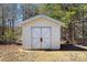 Outdoor shed with double doors, offering practical storage solutions at 1345 Beagle Run, Salisbury, NC 28146