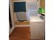 Functional laundry room featuring a washing machine, dryer, and natural light at 1426 E Council St, Salisbury, NC 28146
