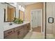 Bathroom with a double sink vanity, tile flooring, and glass enclosed shower at 1529 Pebble Shore Ln # 164, Belmont, NC 28012