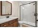 Bathroom showcasing a modern vanity with a walk-in shower, complemented by neutral tones at 1529 Pebble Shore Ln # 164, Belmont, NC 28012