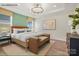 Well-lit main bedroom with a modern light fixture and wood flooring at 1529 Pebble Shore Ln # 164, Belmont, NC 28012