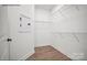 Walk in closet with wood flooring and wire shelving at 1529 Pebble Shore Ln # 164, Belmont, NC 28012