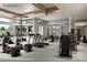 Modern gym with an array of equipment, large windows offering natural light, and a spacious layout for a complete workout at 1529 Pebble Shore Ln # 164, Belmont, NC 28012