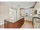 Beautiful kitchen with granite countertops, stainless steel appliances, and custom cabinetry at 1529 Pebble Shore Ln # 164, Belmont, NC 28012