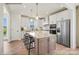 Modern kitchen with a granite island, stainless steel appliances, and custom cabinets at 1529 Pebble Shore Ln # 164, Belmont, NC 28012
