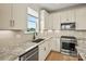 Stylish kitchen with granite countertops, stainless steel appliances, and modern cabinetry at 1529 Pebble Shore Ln # 164, Belmont, NC 28012