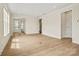 A spacious living room with sleek vinyl flooring, ample natural light, and smooth transitions to other spaces at 1529 Pebble Shore Ln # 164, Belmont, NC 28012