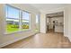 Inviting living room with access to a modern kitchen and scenic backyard views, ideal for Gathering living at 1529 Pebble Shore Ln # 164, Belmont, NC 28012