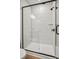 Walk-in shower with glass enclosure, black trim, and white subway tile at 1529 Pebble Shore Ln # 164, Belmont, NC 28012