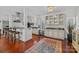 Kitchen features stainless steel appliances, granite countertops, wooden floors and decorative glass front cabinets at 224 N Poplar St # 9, Charlotte, NC 28202