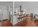 Kitchen with stainless steel appliances, granite countertops, wooden floors and bar seating at 224 N Poplar St # 9, Charlotte, NC 28202