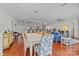 Spacious living room featuring hardwood floors, modern lighting, and comfortable seating area at 224 N Poplar St # 9, Charlotte, NC 28202