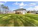 Spacious backyard with lush lawn and a deck perfect for outdoor entertaining and relaxation at 2621 Marble St, Newton, NC 28658