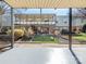 Exterior view of the backyard, which includes patios and grassy areas at 2628 Park Rd # F, Charlotte, NC 28209