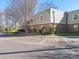 Exterior view of the building with well maintained landscaping and parking at 2628 Park Rd # F, Charlotte, NC 28209
