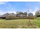 View of the home's fenced backyard with lush lawn at 3009 Rockingham Sw Ct, Concord, NC 28025