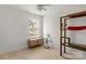 Bright bedroom features hardwood floors, ceiling fan and a window letting in lots of natural light at 3009 Rockingham Sw Ct, Concord, NC 28025