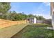 Fenced backyard with a storage shed at 3009 Rockingham Sw Ct, Concord, NC 28025