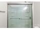 Shower with two sliding glass doors and silver hardware at 3009 Rockingham Sw Ct, Concord, NC 28025