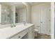 Bright bathroom featuring a spacious vanity, and a separate glass-enclosed shower at 3218 Ellingford Rd, Charlotte, NC 28214