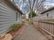 Beautiful backyard with a fence, patio, and meticulous landscaping at 324 Westwood Ave, Charlotte, NC 28203