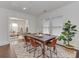 Elegant dining room with a wooden table, comfortable seating, and bright natural light at 324 Westwood Ave, Charlotte, NC 28203