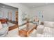Spacious living room featuring stylish decor, hardwood floors, and an open layout at 324 Westwood Ave, Charlotte, NC 28203