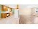 Spacious kitchen featuring wooden cabinets, white appliances, and a bright, open layout at 341 Massey Deal Rd, Statesville, NC 28625