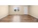 Bright living room with wood floors and a window at 341 Massey Deal Rd, Statesville, NC 28625